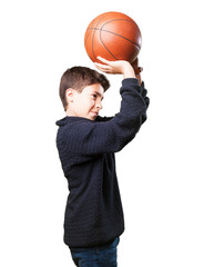boy playing basket