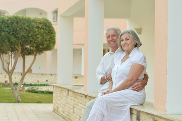 Senior couple near hotel resort