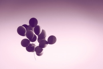 Fototapeta na wymiar Balloons in air vintage