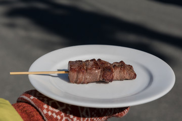 Marbled martinated fresh Hida Japanese beef skewer grilled, Taklamakan, Japan.