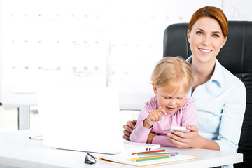 Business woman and daughter while working day