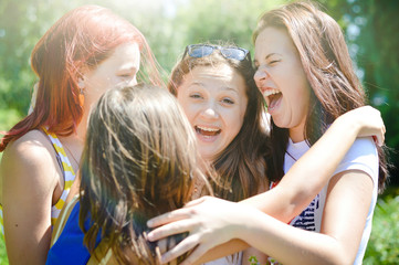 Friends congratulating a girl on her birthday