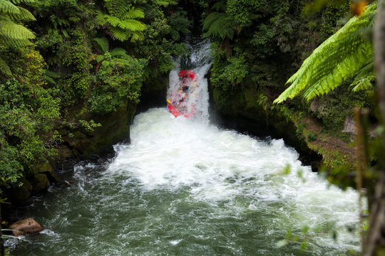 A whitewater fafters running rapid on the Kaituna River in New Zealand