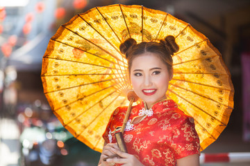 Beautiful Asian model wearing traditional Cheongsam 