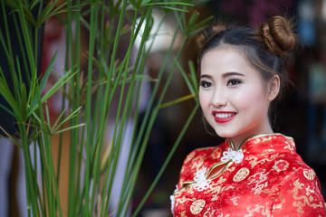 Beautiful Asian model wearing traditional Cheongsam 