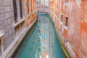 Fototapeta na wymiar Lovely bridge on the canal of Venice