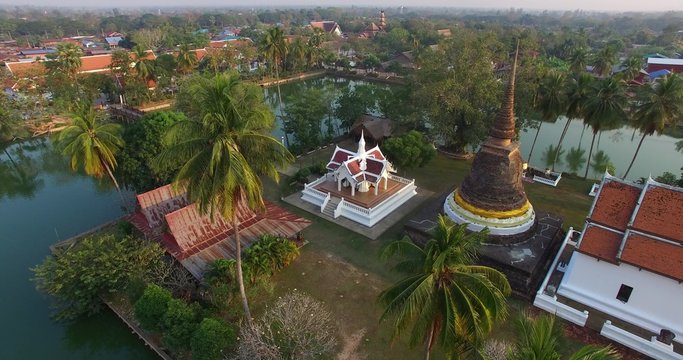 A 4k, 25 fps aerial footage of Wat Traphang Thong (Traphang Thong temple) in the area of ancient city of Sukhothai, Thailand. The temple is public property, no property release document required. 