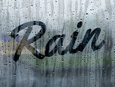 Rain written on a foggy window