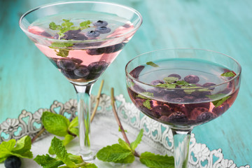 Homemade blueberry mojito cocktail.