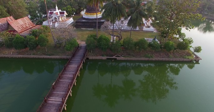 A 4k, 25 fps aerial footage of Wat Traphang Thong (Traphang Thong temple) in the area of ancient city of Sukhothai, Thailand. The temple is public property, no property release document required.