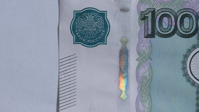 Macro close up dolly shot of the 1000 rubles 3