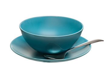 blue ceramic bowl with spoon and plate isolated on white background