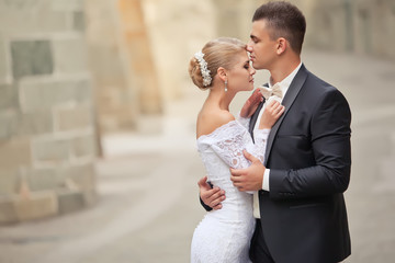 Bride and groom in a old town 