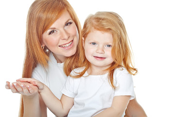 Mother with daughter in studio, white background 