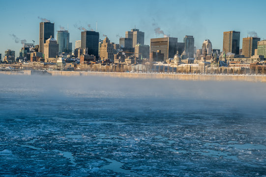 Montreal skyline in winter, with frozen St-Lawrence river