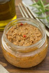 paste on glass on brown wooden background