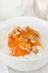 cheese with pumpkin jam and nuts in bowl