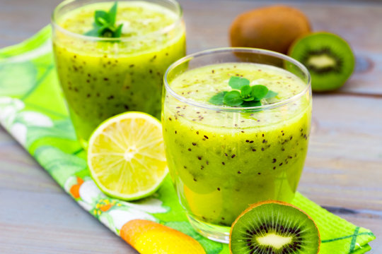 Fresh healthy kiwi juice with mint leaves