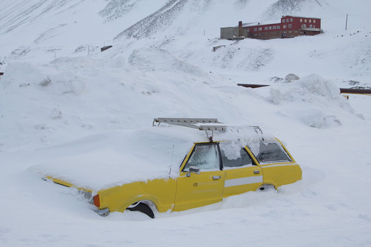 Car covered with snow. Longyearbyen, Spitsbergen (Svalbard). Norway