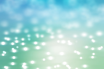 Bokeh light, shimmering blur spot lights on blue abstract