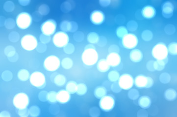 Bokeh light, shimmering blur spot lights on blue abstract