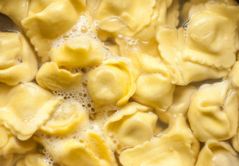 ravioli in sauce pan