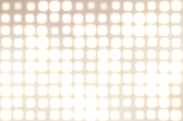 Image of defocused stadium lights. Abstract brown background
