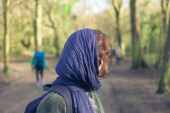 Woman with scarf in park