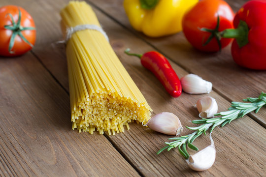 Italian spaghetti, tomatoes, sweet pepper, hot pepper, garlic an