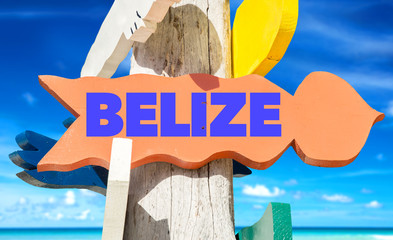 Belize welcome sign with beach