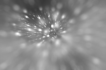 Bokeh light, shimmering blur spot lights on silver abstract 