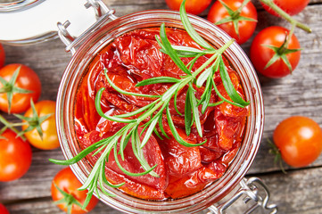 Sun dried tomatoes with olive oil in a jar
