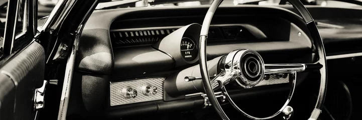 Door stickers Vintage cars interior of classic car with close up on dashboard with steering wheel. 