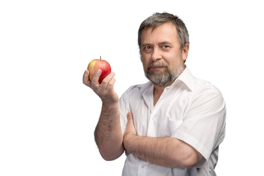 Middle-aged Man Holding A Red Apple