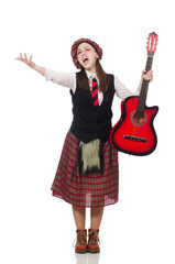 Woman in scottish clothing with guitar