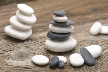 zen stones on the old wooden background