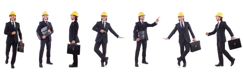 Young architect wearing hardhat on white