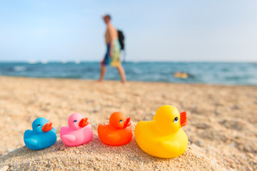 Fototapeta na wymiar Colorful toys at the summer beach
