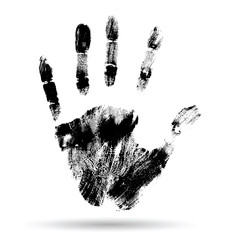 Conceptual black paint human hand or handprint of child