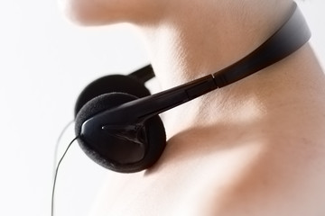 Headphones around a woman's neck
