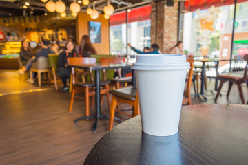 White coffee cup in coffee shop