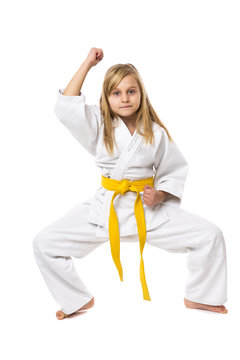 Portrait of little girl training ashihara martial art