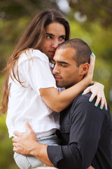 Fototapeta premium Couple having fun at the park