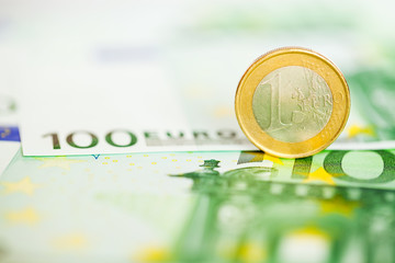 One euro coin on edge