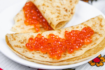 Pancakes and red caviar