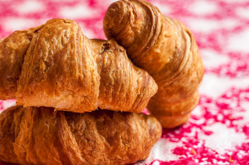 Croissants, big, delicious croissants on a table. Fresh bakery