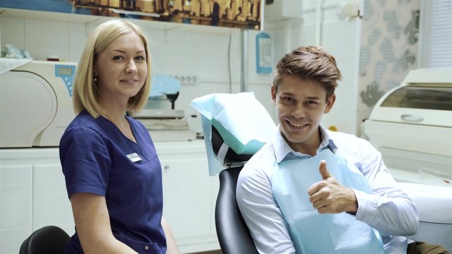 Man is satisfied with dentist's work