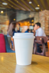 White coffee cup in coffee shop