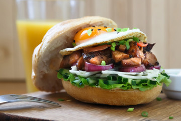 Delicious Egg Burger On Wooden Plate close view