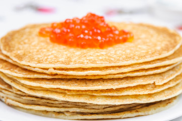 Pancakes and red caviar
